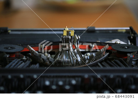 typewriter with the figurines in work typewriter with the figurines in work 68443091