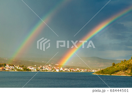Rainbow over the sea bay near The Rogoznica Rainbow over the sea bay near The Rogoznica 68444501