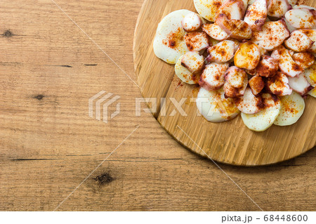 Pulpo a la gallega. Galician octopus on wood. Typical spanish food	 68448600