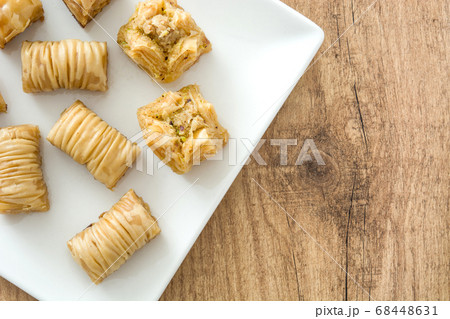 Turkish dessert baklava on wooden table	 68448631