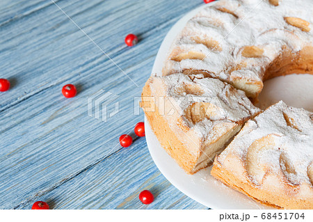 Fresh homemade apple pie on wooden background. Fresh homemade apple pie on wooden background. 68451704
