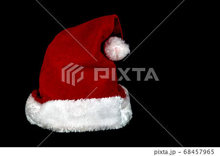 Christmas Santa Hat on a Black Background 68457965