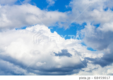 large white and gray clouds in blue sky 68459017