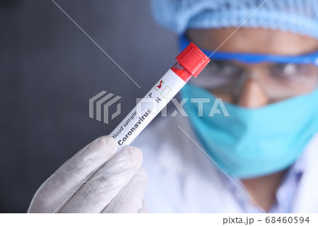 laboratory technician testing corona virus , COVID 19 test. laboratory technician testing corona virus , COVID 19 test. 68460594