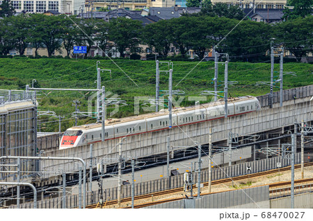 富山・神通川を渡るEast-i 68470027
