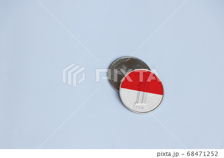 Indonesia flag on the coin of one thousand Rupiah. Indonesia flag on the coin of one thousand Rupiah. 68471252