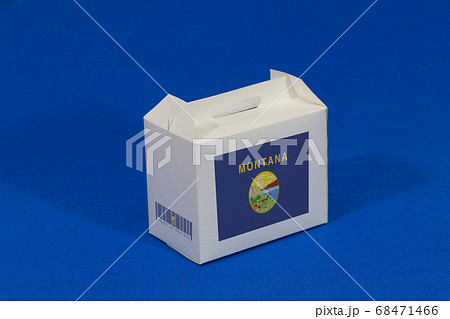 Montana flag on white box with barcode and the color of state flag. 68471466