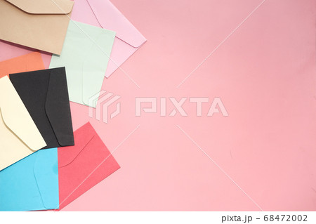colorful envelope on pink background with copy space. 68472002