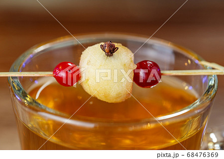 Decor on a glass apple on a skewer 68476369