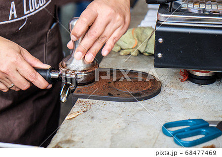 Coffee pouring machine close up in modern cafe 68477469