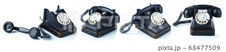 Old black phone isolated on white. 68477509