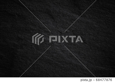 Dark grey black slate background or natural stone Dark grey black slate background or natural stone 68477876