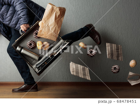 The man runs and loses the contents of his The man runs and loses the contents of his 68478451