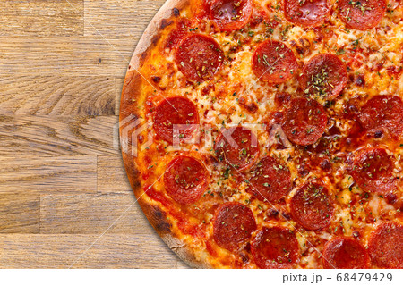 fresh baked pizza with salami fresh baked pizza with salami 68479429