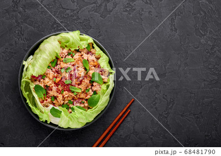 Laab Gai - Thai Minced Chicken Salad in black bowl Laab Gai - Thai Minced Chicken Salad in black bowl 68481790
