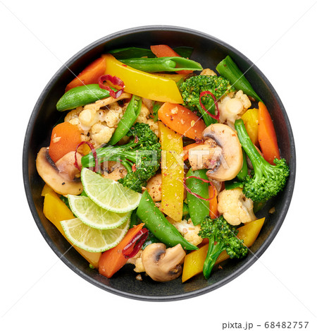 Pad Pak Ruam or Veg Thai Stir-Fried Vegetables in black bowl isolated on white Pad Pak Ruam or Veg Thai Stir-Fried Vegetables in black bowl isolated on white 68482757