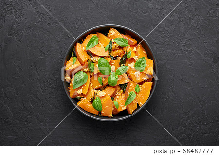 Pad Faktong or Thai Stir-fried Pumpkin in black bowl Pad Faktong or Thai Stir-fried Pumpkin in black bowl 68482777