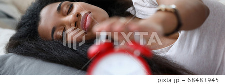 Woman waking up 68483945