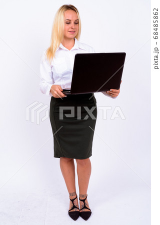 Portrait of happy young beautiful businesswoman with blond hair Portrait of happy young beautiful businesswoman with blond hair 68485862