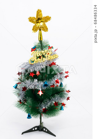 Christmas tree with Merry Christmas text against white background Christmas tree with Merry Christmas text against white background 68486334