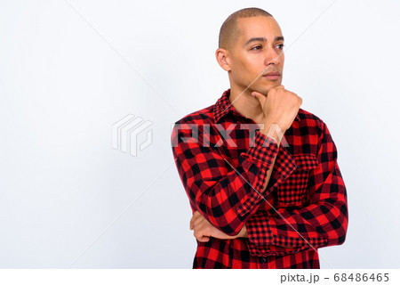 Portrait of handsome multi ethnic bald hipster man Portrait of handsome multi ethnic bald hipster man 68486465