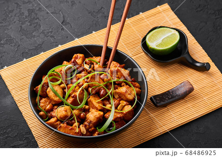 Kung Pao Chicken or Gong Bao Ji Ding at dark slate table top 68486925