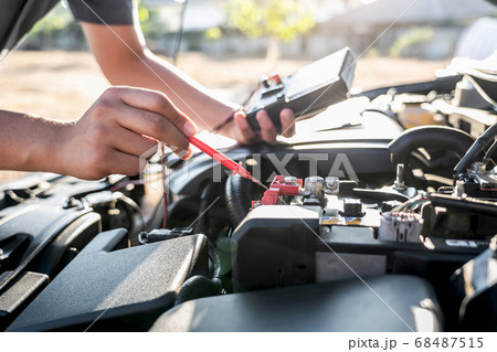 Mechanic repairman checking engine automotive in Mechanic repairman checking engine automotive in 68487515