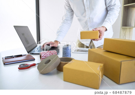 Young business owner work at home receive order Young business owner work at home receive order 68487879
