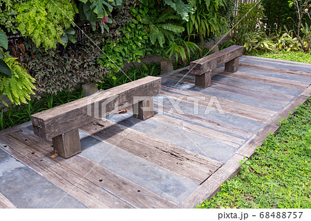 Wood bench made from log. Wood bench made from log. 68488757