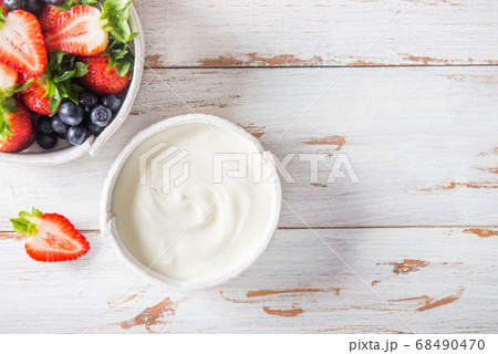 Bowl of natural yogurt with fresh berries Bowl of natural yogurt with fresh berries 68490470