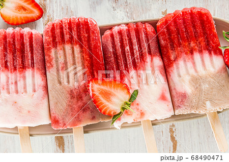 Homemade Vegan Strawberry Popsicle from Strawberry Juice and Coc 68490471
