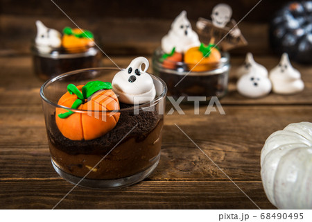 Chocolate Dirt Pudding for Halloween with Meringue Ghosts 68490495