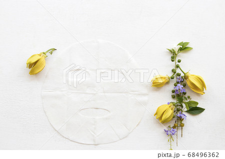 natural aroma sheet mask for skin face from herbal ylang ylang yellow flowers essence face mask 68496362