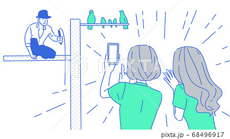 とまり木にとまった有名人の写真をスマホで撮る女性たち とまり木にとまった有名人の写真をスマホで撮る女性たち 68496917