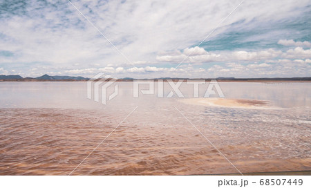 Endless landscapes with reflection like mirror of sky in Salar de Uyuni, Bolivia Endless landscapes with reflection like mirror of sky in Salar de Uyuni, Bolivia 68507449