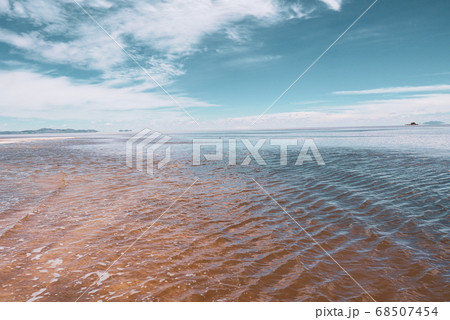 Endless landscapes with reflection like mirror of sky in Salar de Uyuni, Bolivia 68507454