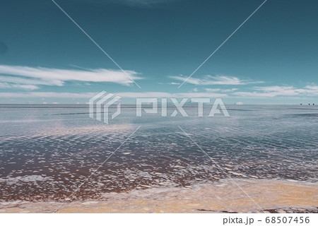 Endless landscapes with reflection like mirror of sky in Salar de Uyuni, Bolivia 68507456