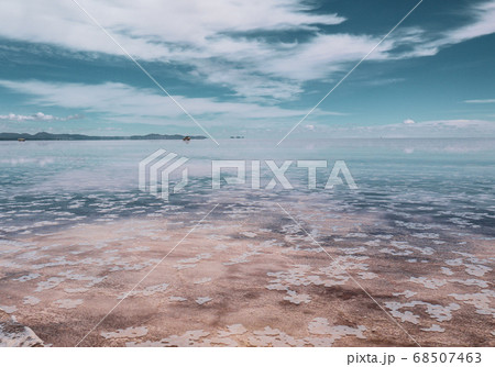 Endless landscapes with reflection like mirror of sky in Salar de Uyuni, Bolivia 68507463