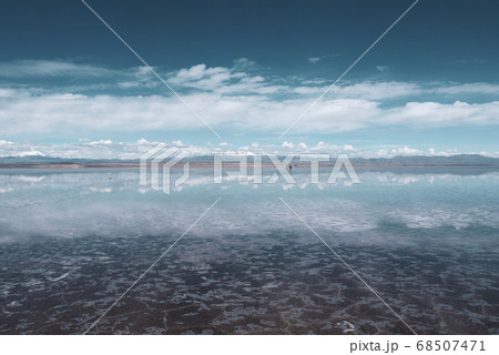 Endless landscapes with reflection like mirror of sky in Salar de Uyuni, Bolivia 68507471