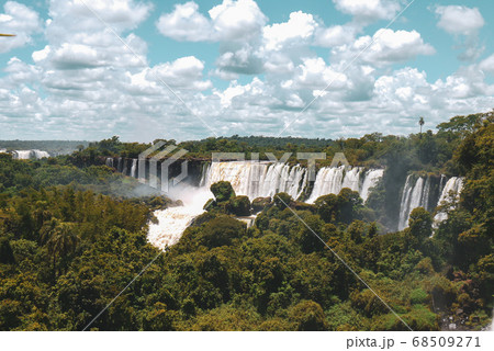 Iguazu waterfalls with the blue sky in Iguazu National park in Argentina 68509271