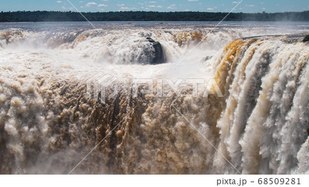 Iguazu waterfalls with the blue sky in Iguazu National park in Argentina 68509281
