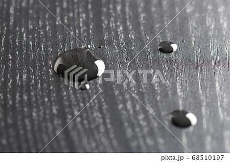 Water droplets on wooden surface Water droplets on wooden surface 68510197