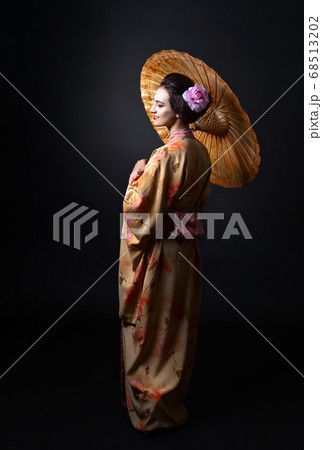 beautiful woman in traditional Japanese kimono beautiful woman in traditional Japanese kimono 68513202