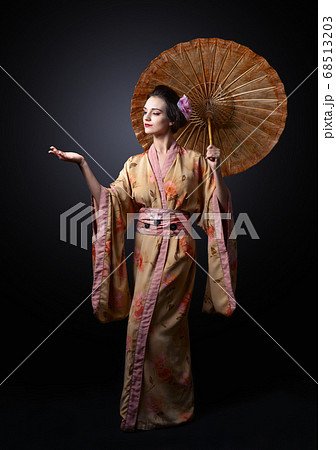 beautiful woman in traditional Japanese kimono beautiful woman in traditional Japanese kimono 68513203