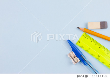 Office supplies on a light blue background. Office supplies on a light blue background. 68514100