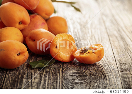 Fresh apricots on a old wooden table. 68514499
