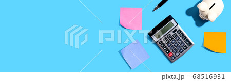 Calculator with a piggy bank 68516931