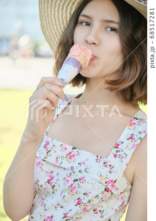 girl eats ice-cream 68517281