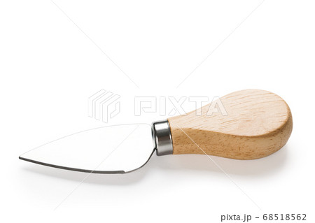 Cheese knife isolated on whitebackground. Closeup Cheese knife isolated on whitebackground. Closeup 68518562