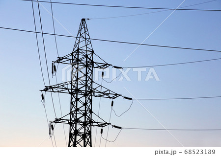 masts and wires on a background blue sky. 68523189
